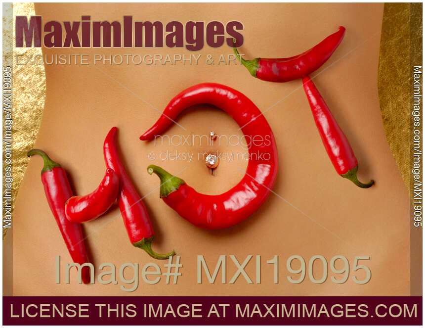 Hot chili peppers on sexy woman body