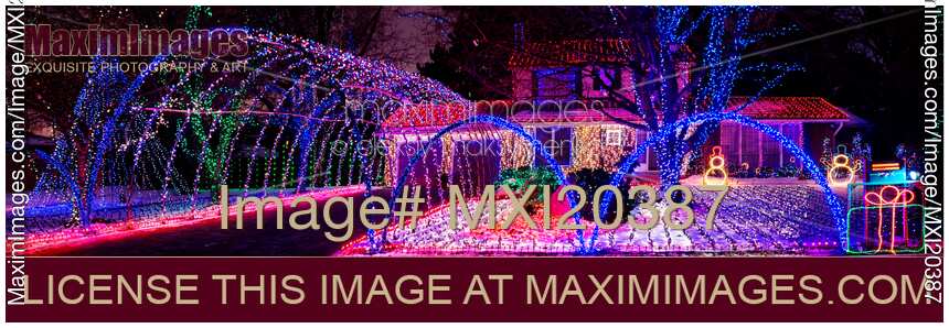 House Decorated with Christmas Lights Panorama