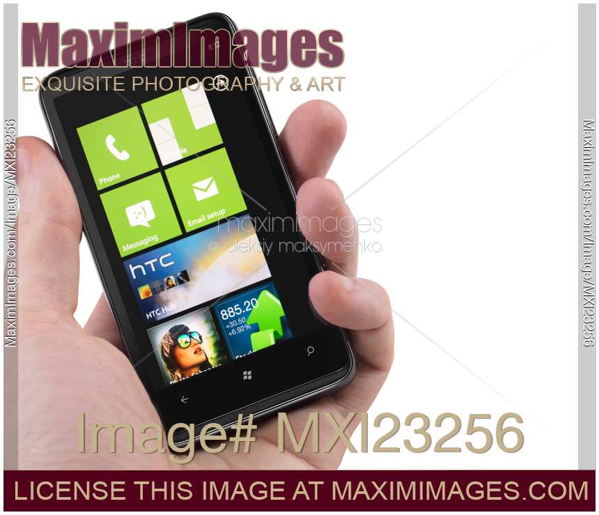 HTC HD7 Smartphone Windows 7 Phone in a Hand