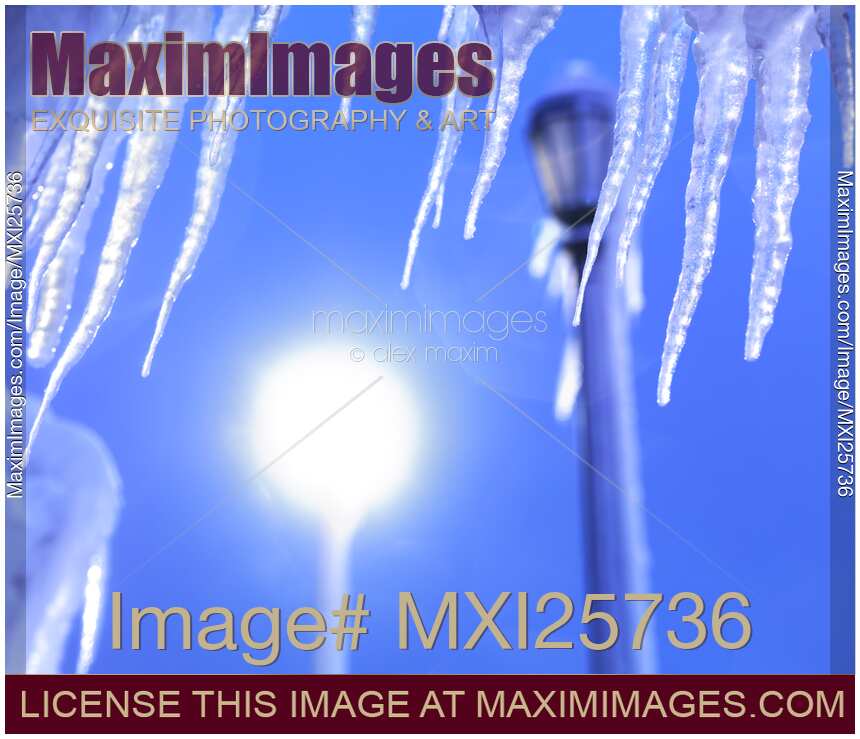 Icicles against blue sky
