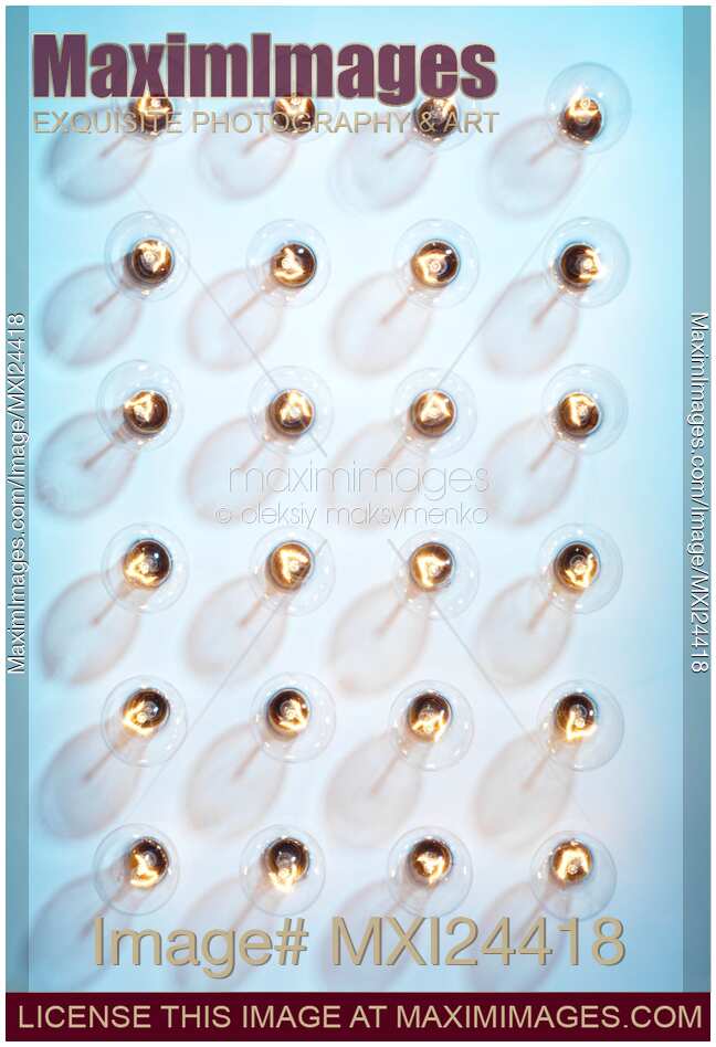 Incandescent light bulbs on blue