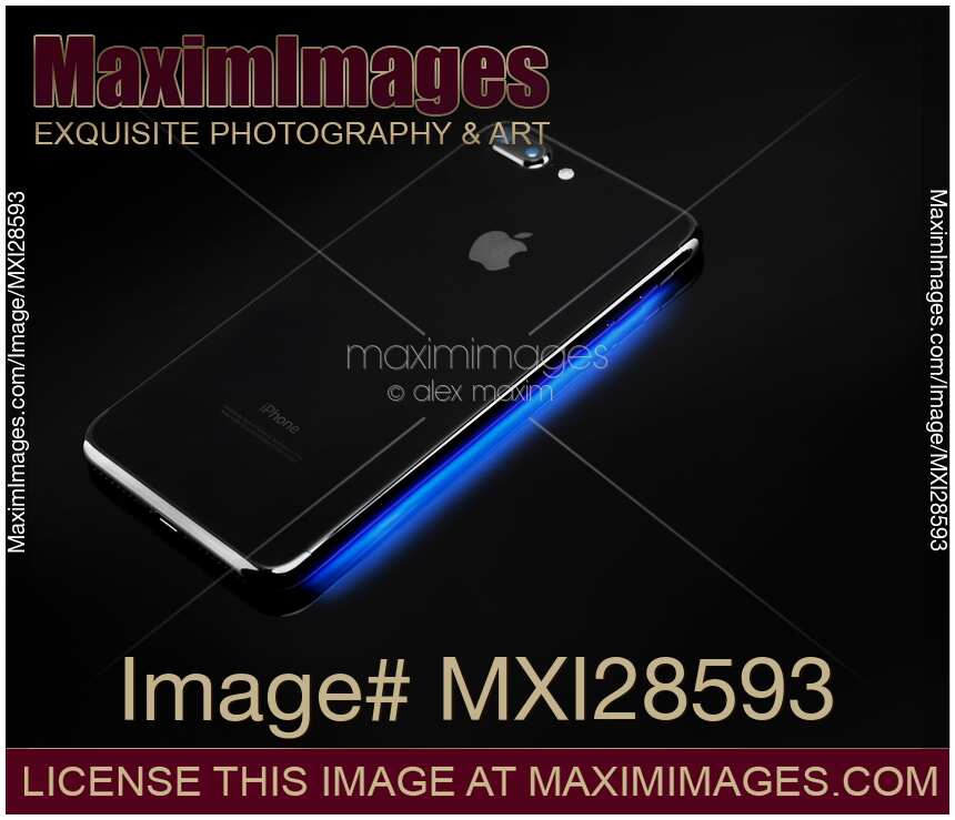 iPhone 7 with blue light coming from under it