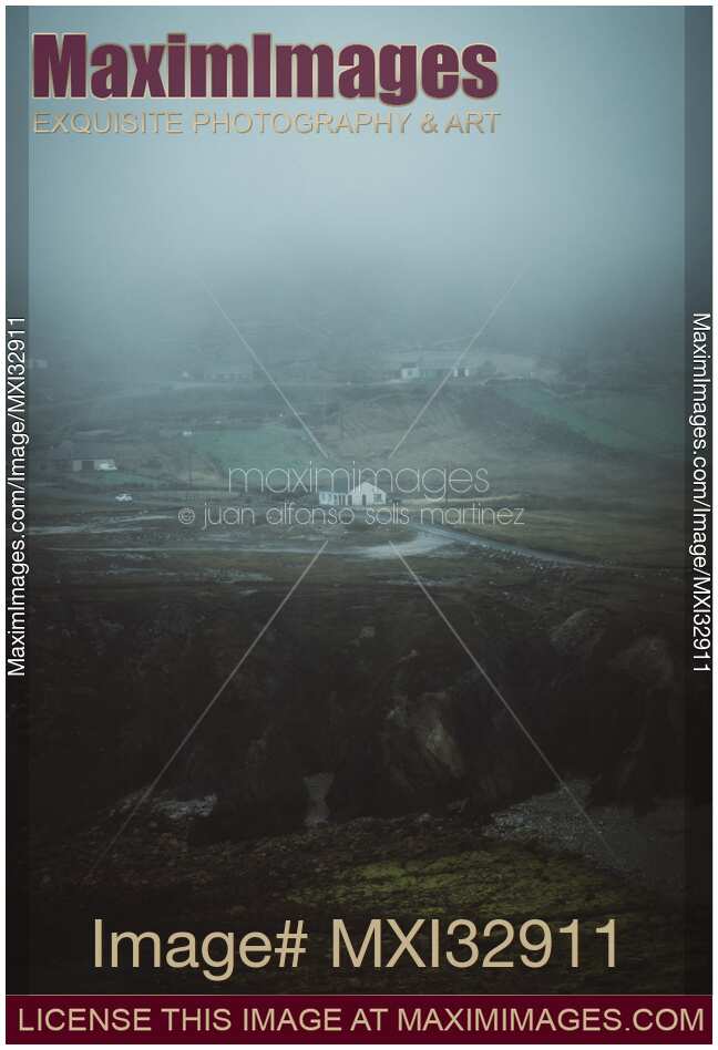 Isolated house in dark moody foggy countryside landscape scenery in Sligo Ireland
