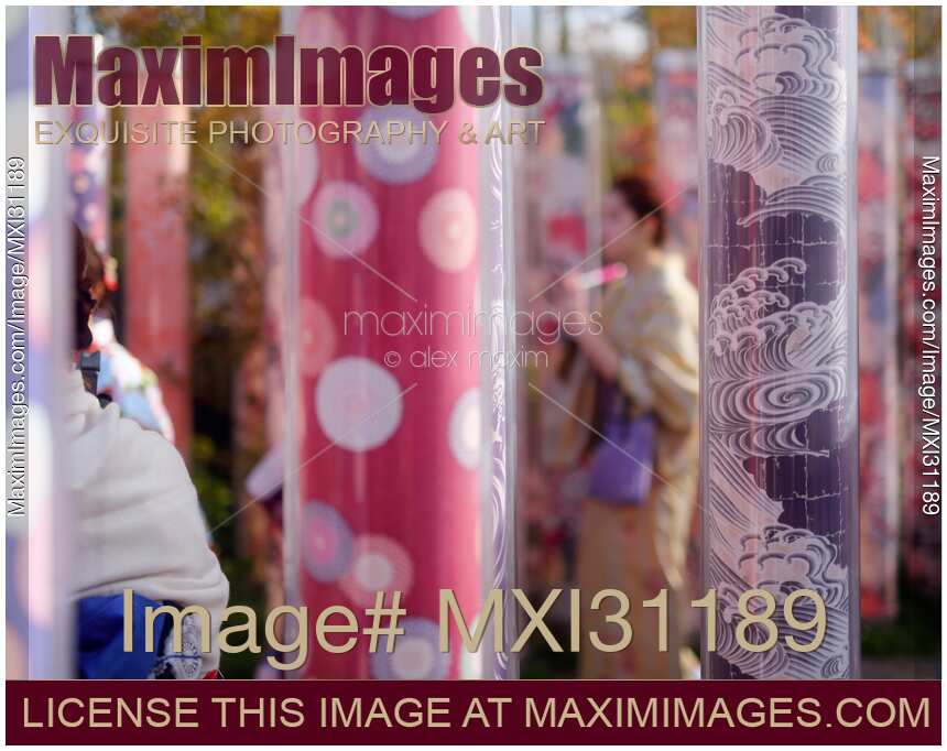 Japanese girls in kimonos at Arashiyama station Kimono Forest in Kyoto