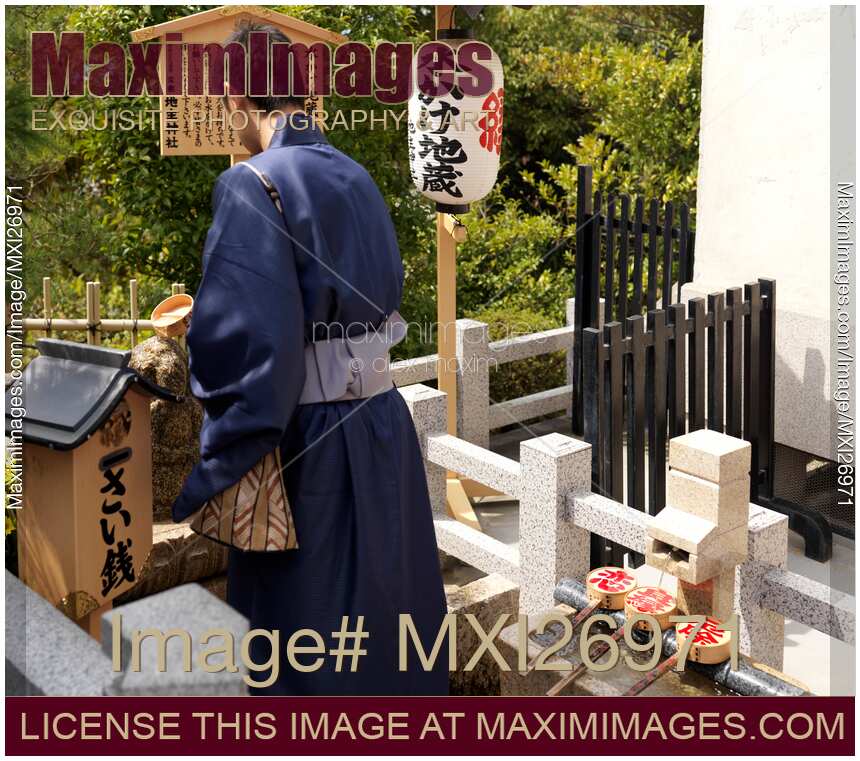 Japanese man at Jishu Jinja shrine of love and marriage at Kiyomizu-dera in Kyoto