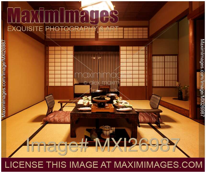 Japanese ryokan hotel room with dinner on table