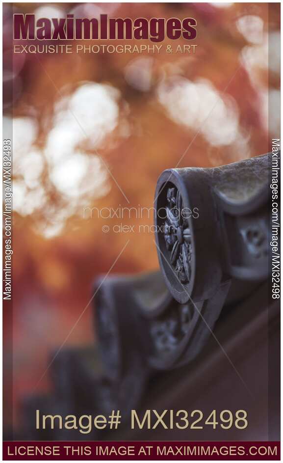 Japanese temple roof eaves with ornamental clay roofing tile Kawara closeup of details