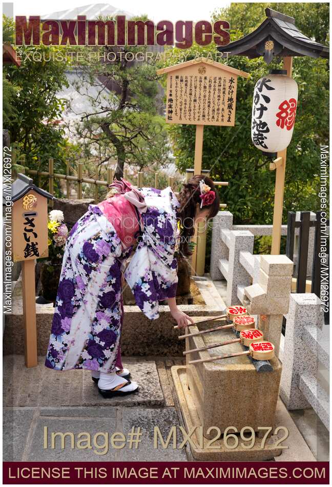 Japanese woman at Jishu Jinja shrine of love and marriage at Kiyomizu-dera in Kyoto