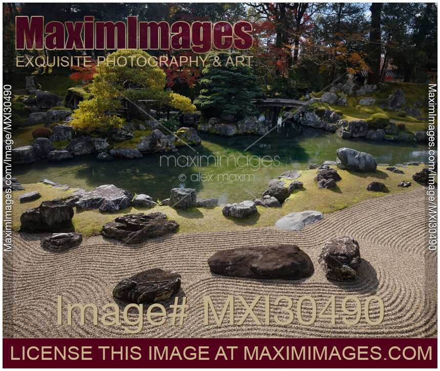 Japanese Zen rock garden with Kamo no Sanseki stones in front of a pond at Sanboin Buddhist temple Daigoji Kyoto Japan