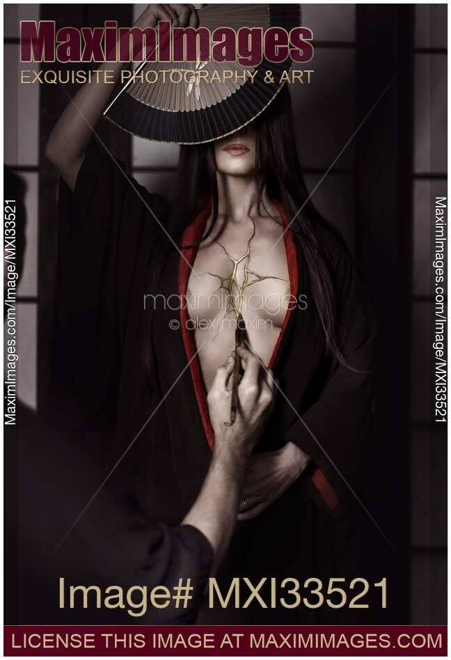 Kintsugi master filling with gold cracks in the chest of a beautiful asian woman repairing her broken heart. Japanese Zen wabi-sabi concept.