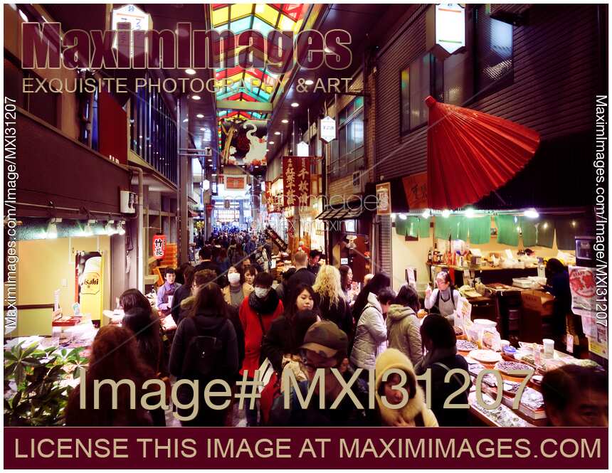 Kyoto Nishiki Food Market historic shopping district busy with people and vendors