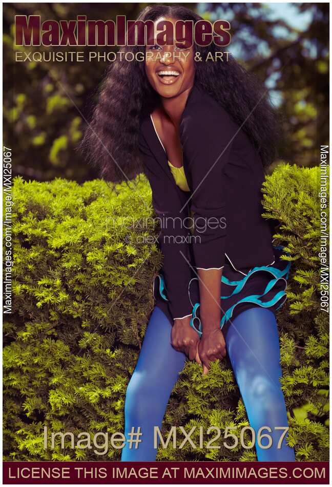 Laughing Young Black Woman in Park