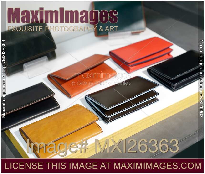 Leather wallets on display in a store