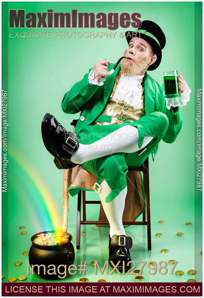 Leprechaun with mug of green beer and pot of gold