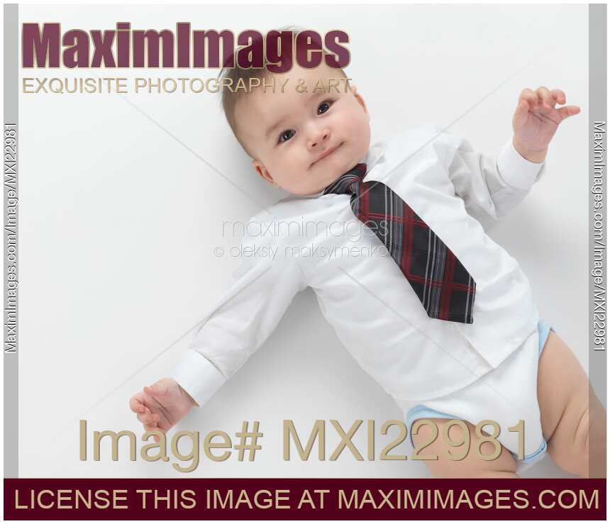 Little Boy in a Dress Shirt and a Tie