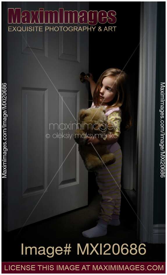 Little Girl Looking out of a Room at Night