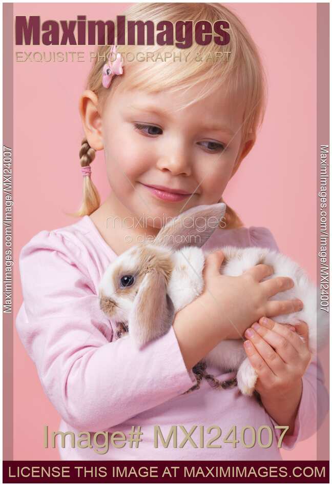 Little girl with a bunny