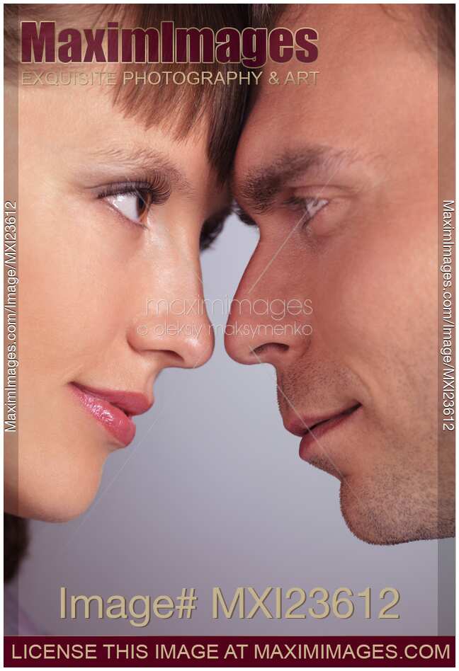 Man and Woman Touching Foreheads