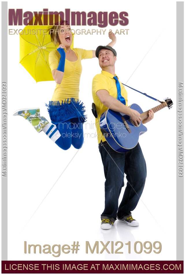 Man Playing Guitar and Woman Dancing
