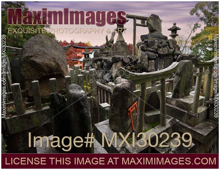 Many personal small Shinto shrines at Fushimi Inari shrine in Kyoto Japan