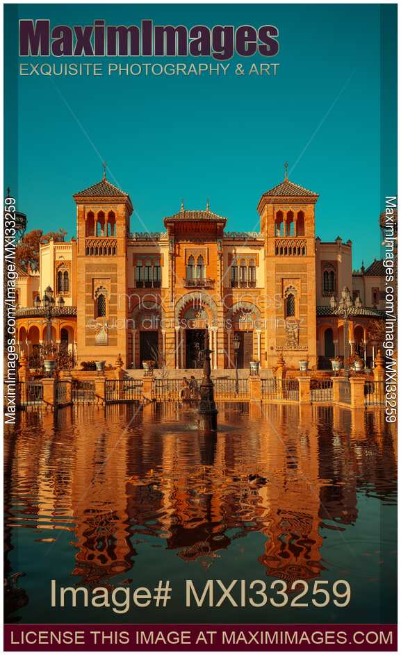 Maria Luisa Park with historic buildings by a pond in Seville Spain