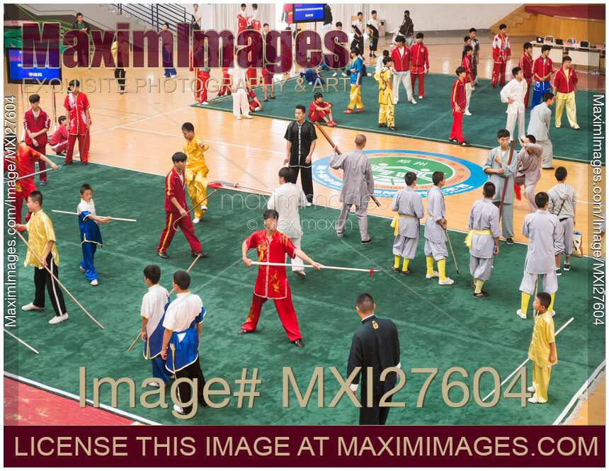 Martial artsts practicing their performance at Zhengzhou Shaolin Wushu festival