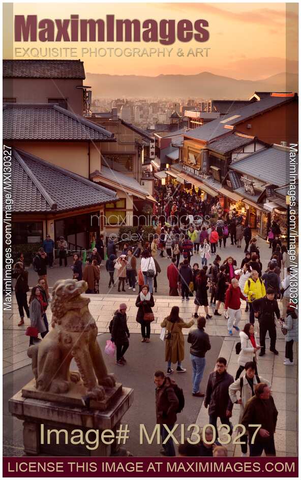 Matsubara dori street full of people at sunset near Kiyomizu-dera temple in Kyoto Japan