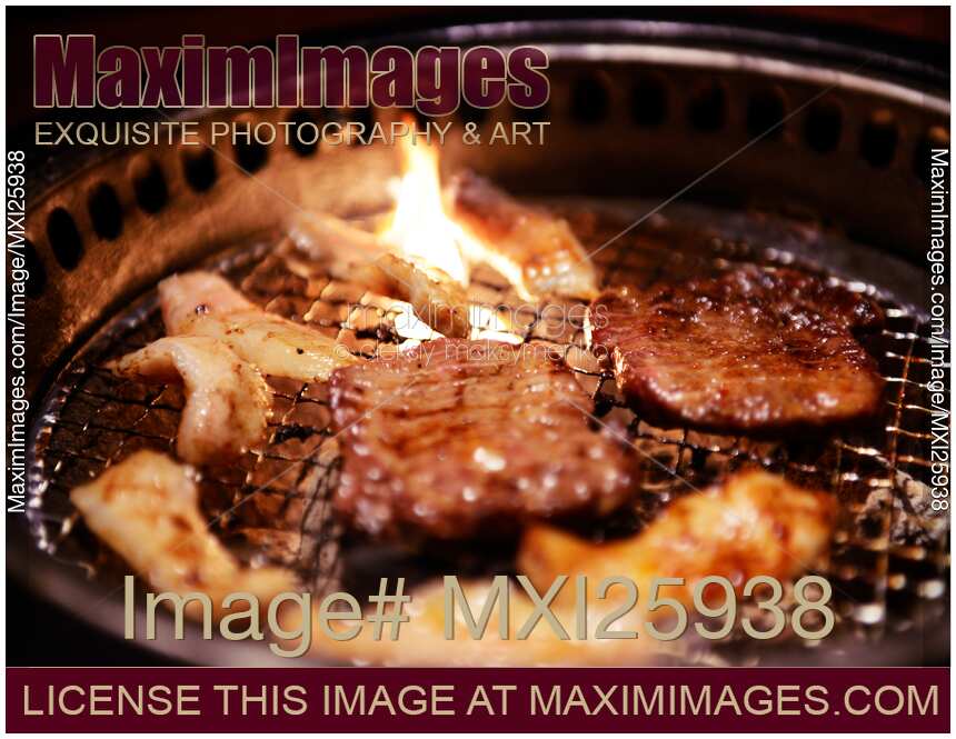 Meat on grill at Japanese restaurant