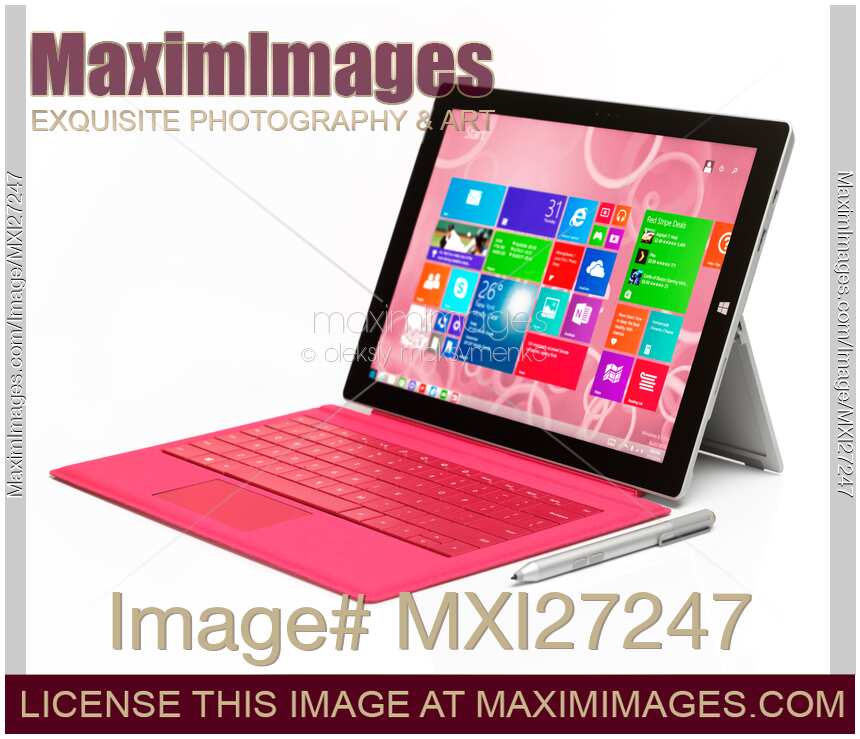 Microsoft Surface Pro 3 tablet with pink keyboard