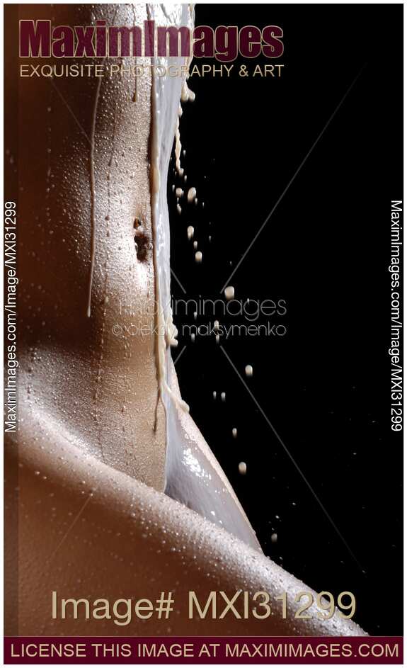 Milk Dripping over Nude Woman Body