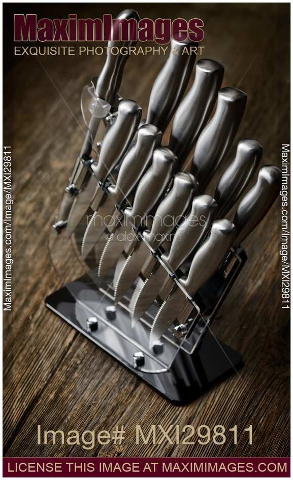 Modern steel kitchen knives set in knife block
