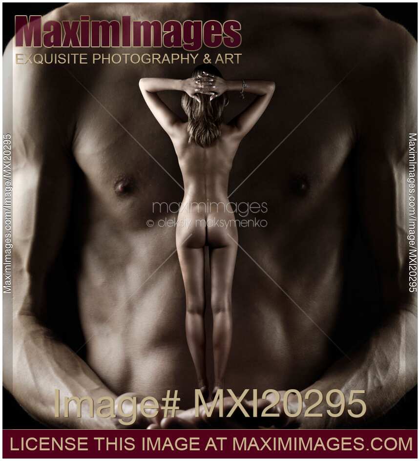 Muscular Man Holding Nude Woman in His Hands