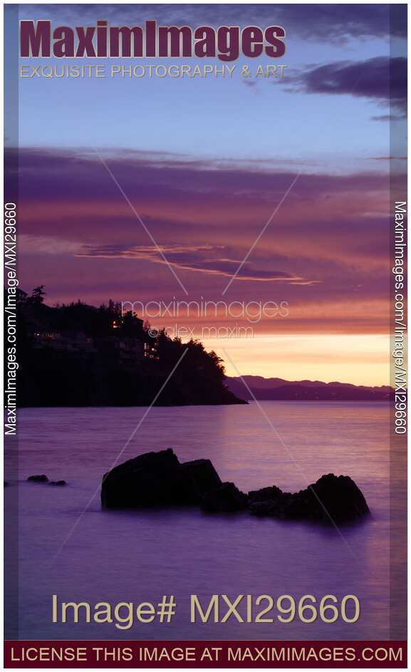 Nanaimo BC pink sunset surreal scenery of the ocean coast on Vancouver Island