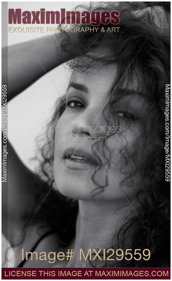 Natural beauty black and white portrait of a woman face with sensual lips and beautiful long hair