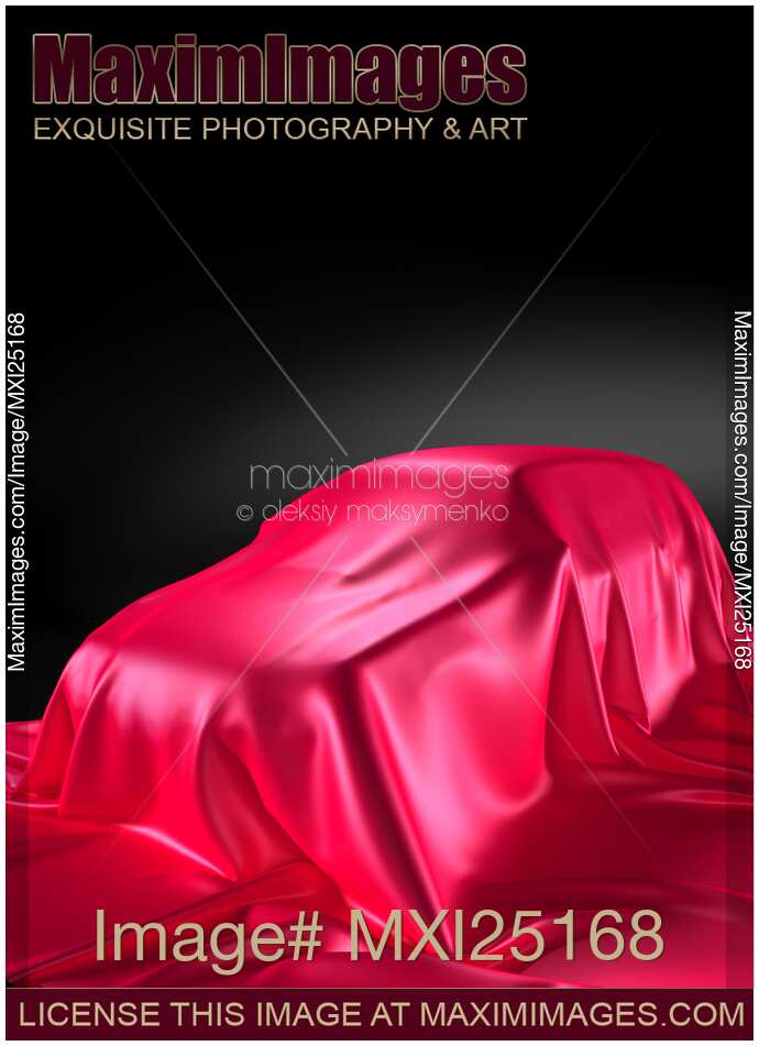 New car model covered with red shiny fabric