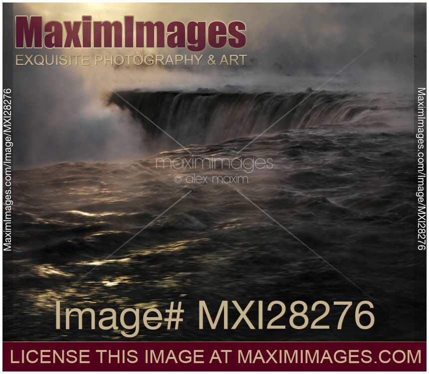Niagara Falls covered in mist beautiful dramatic winter sunrise scenery