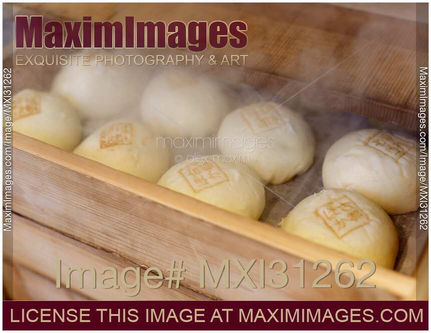 Nikuman Japanese steamed pork buns in a steamer of street shop