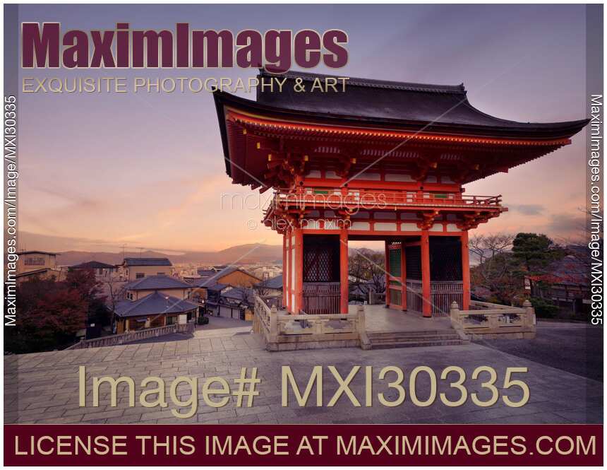 Nio-mon gate of Kiyomizu-dera Buddhist temple at sunrise and Kyoto city landscape