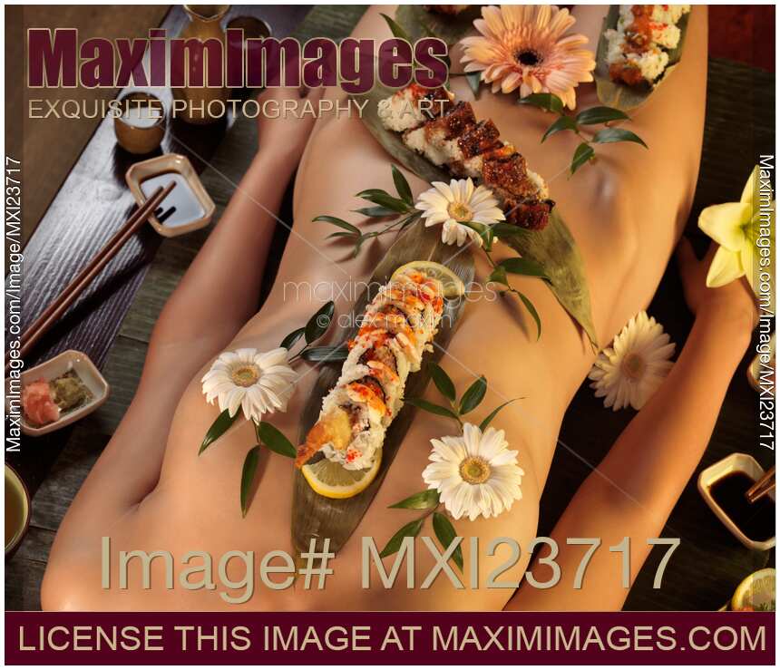 Nude asian woman serving Nyotaimori Body Sushi