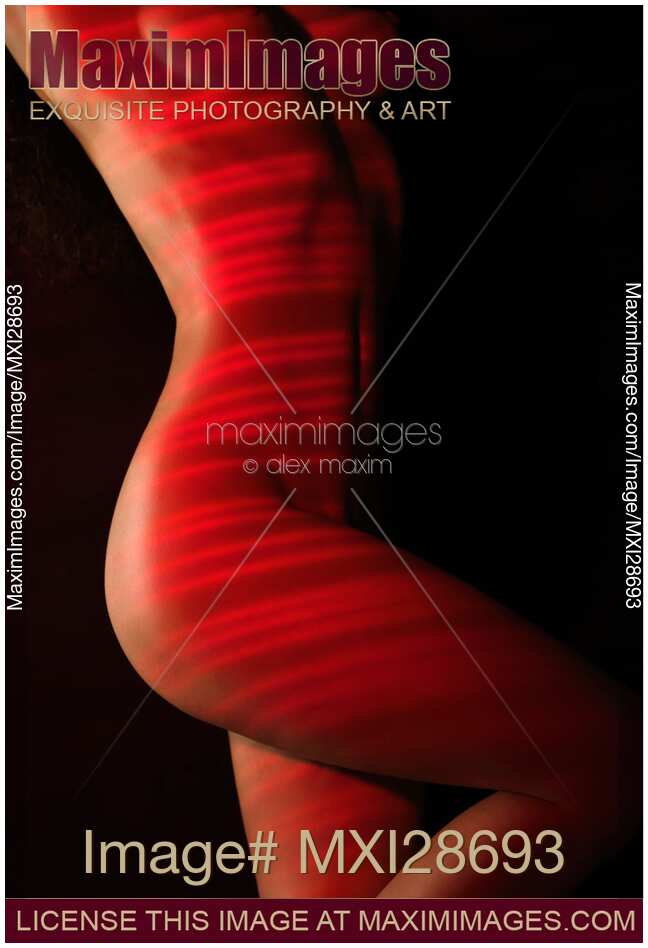 Nude woman body with red laser stripes skin rejuvenation concept