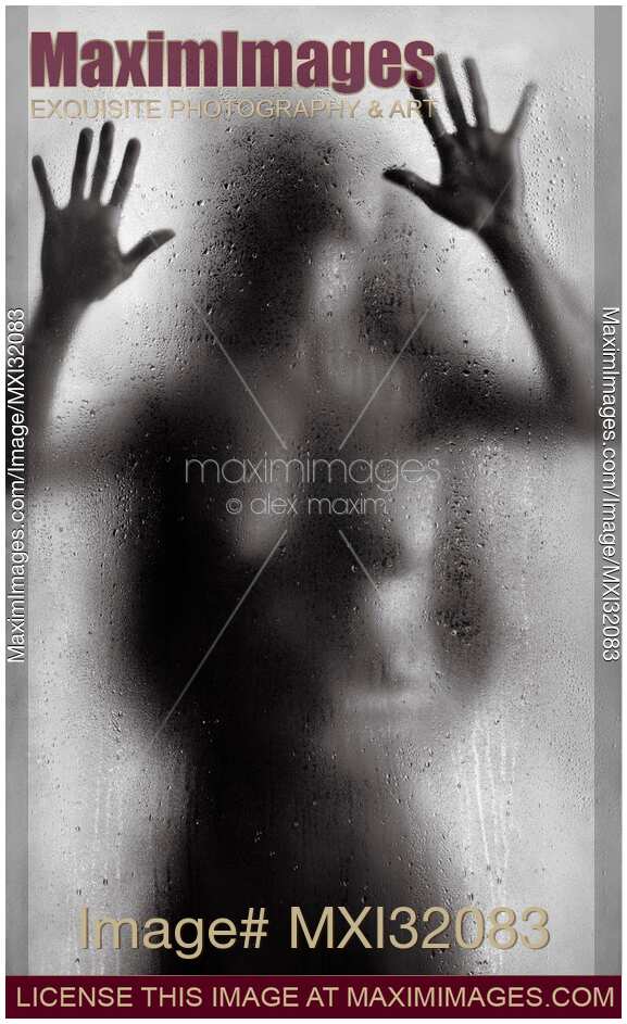 Nude woman leaning against wet glass with man hands around her waist Couple making love Black and white