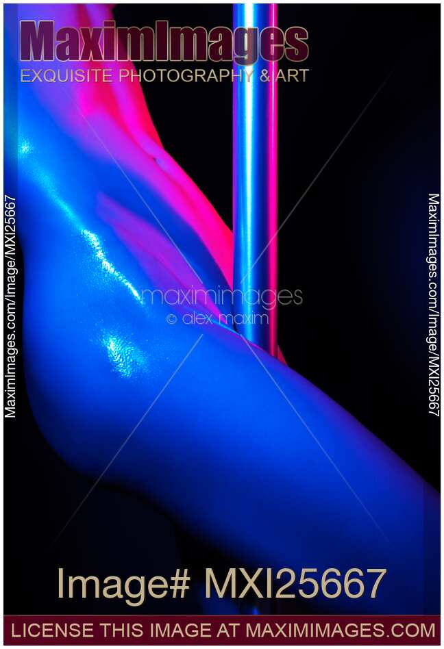 Nude woman pole dancing closeup of body