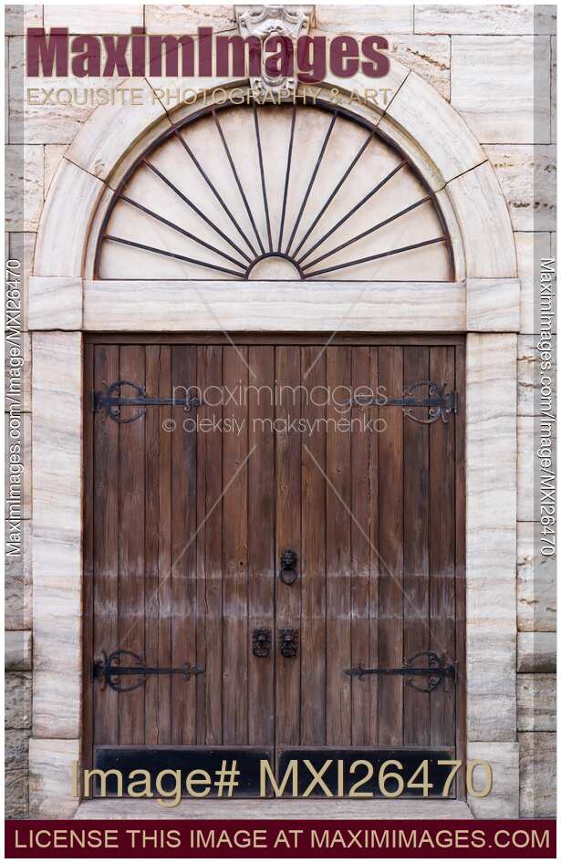 Old wooden door of Venetian building