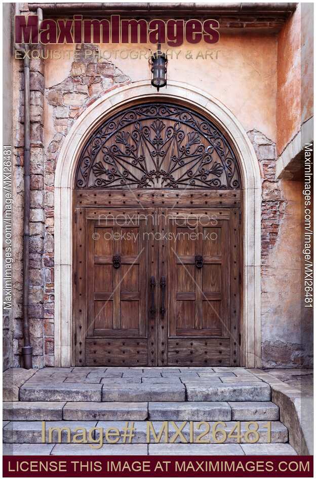 Old wooden door of Venetian building