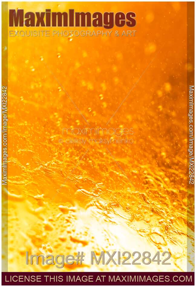 Orange splashing water abstract background