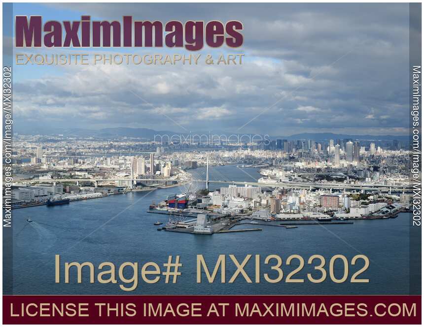 Osaka Bay waterfront Osaka city skyline Tempozan bridge in aerial city scenery Japan