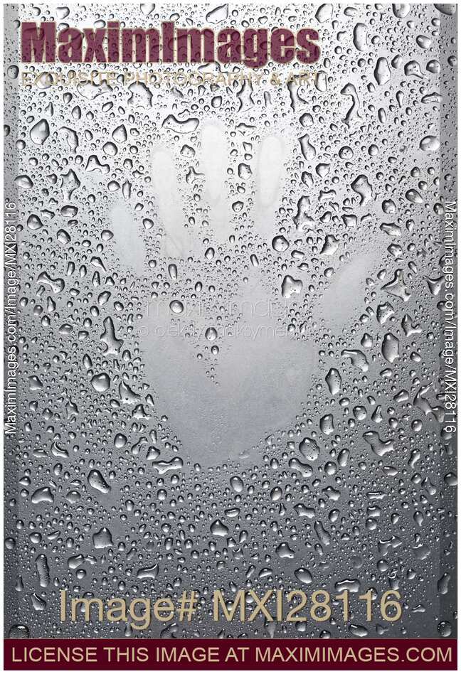 Palm print on wet metal surface