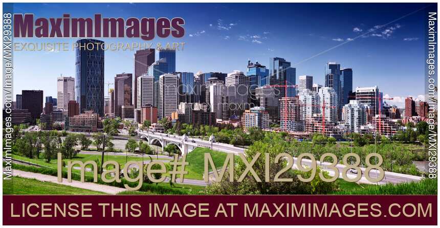 Panoramic scenery of Calgary downtown skyline and Centre Street Bridge on a summer day