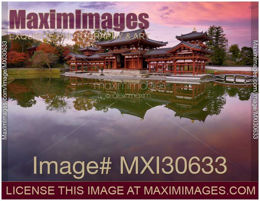 Peaceful autumn scenery of the Phoenix Hall of Byodoin temple on Kojima island of Jodoshiki teien pond Uji