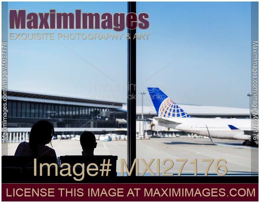 People at airport waiting for their flight